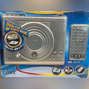 Coby ultra compact portable DVD/MP3/CD player w/remote-New/package damaged